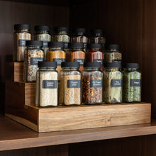 Load image into Gallery viewer, acacia wood expandable riser on kitchen shelf holding spice jars