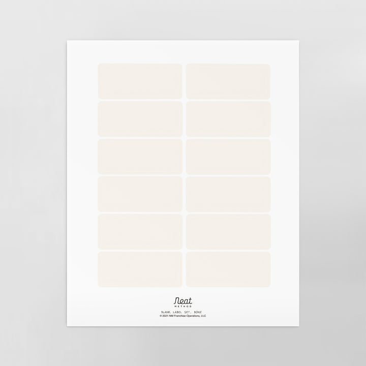 one sheet of white, blank removable labels for organizing