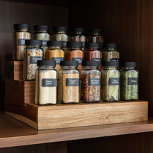 Load image into Gallery viewer, acacia wood expandable riser on kitchen shelf holding spice jars
