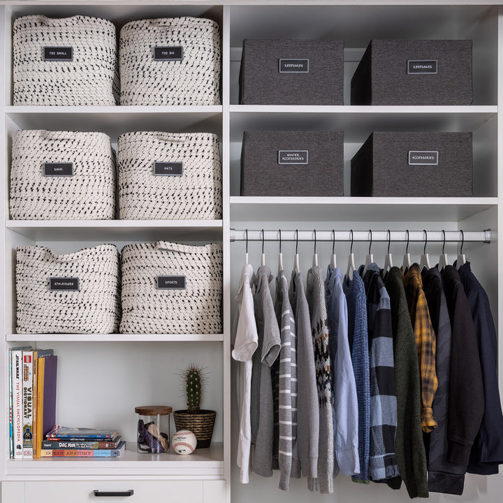 men's closet organized with labeled fabric bins 