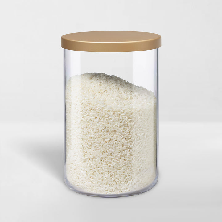 transparent storage canister with gold lid holding rice