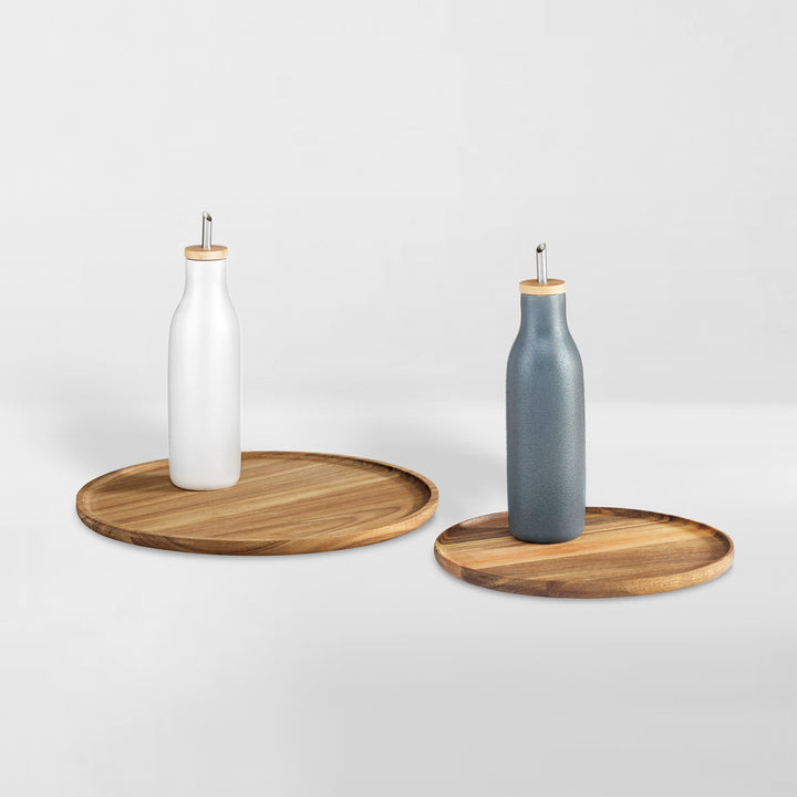 one small and one large acacia wood turntables, lazy susans holding oil cruet