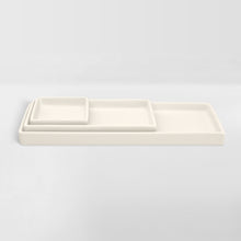 Load image into Gallery viewer, set of nested white ceramic trays for organizing

