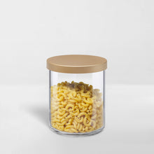 Load image into Gallery viewer, transparent storage canister with gold lid holding pasta
