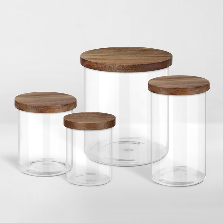 grouping of various sized glass jars with airtight acacia wood lids