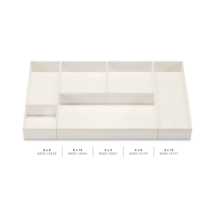 full set of white drawer organizers showing dimensions of each individual unit
