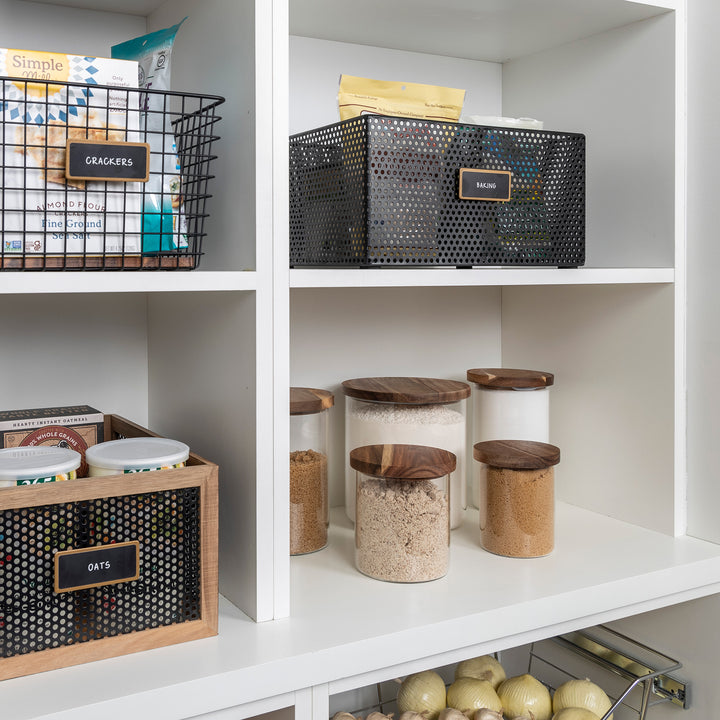 pantry with shelf of glass jars with acacia wood lids holding baking supplies