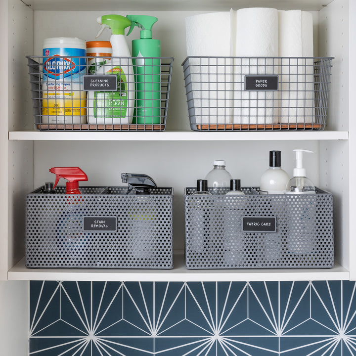 laundry cabinet with grey metal baskets and black removable labels